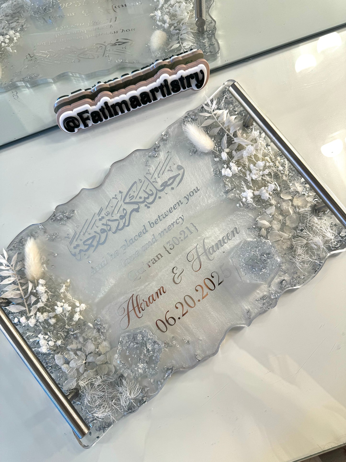 Silver and white dried flowered ring tray