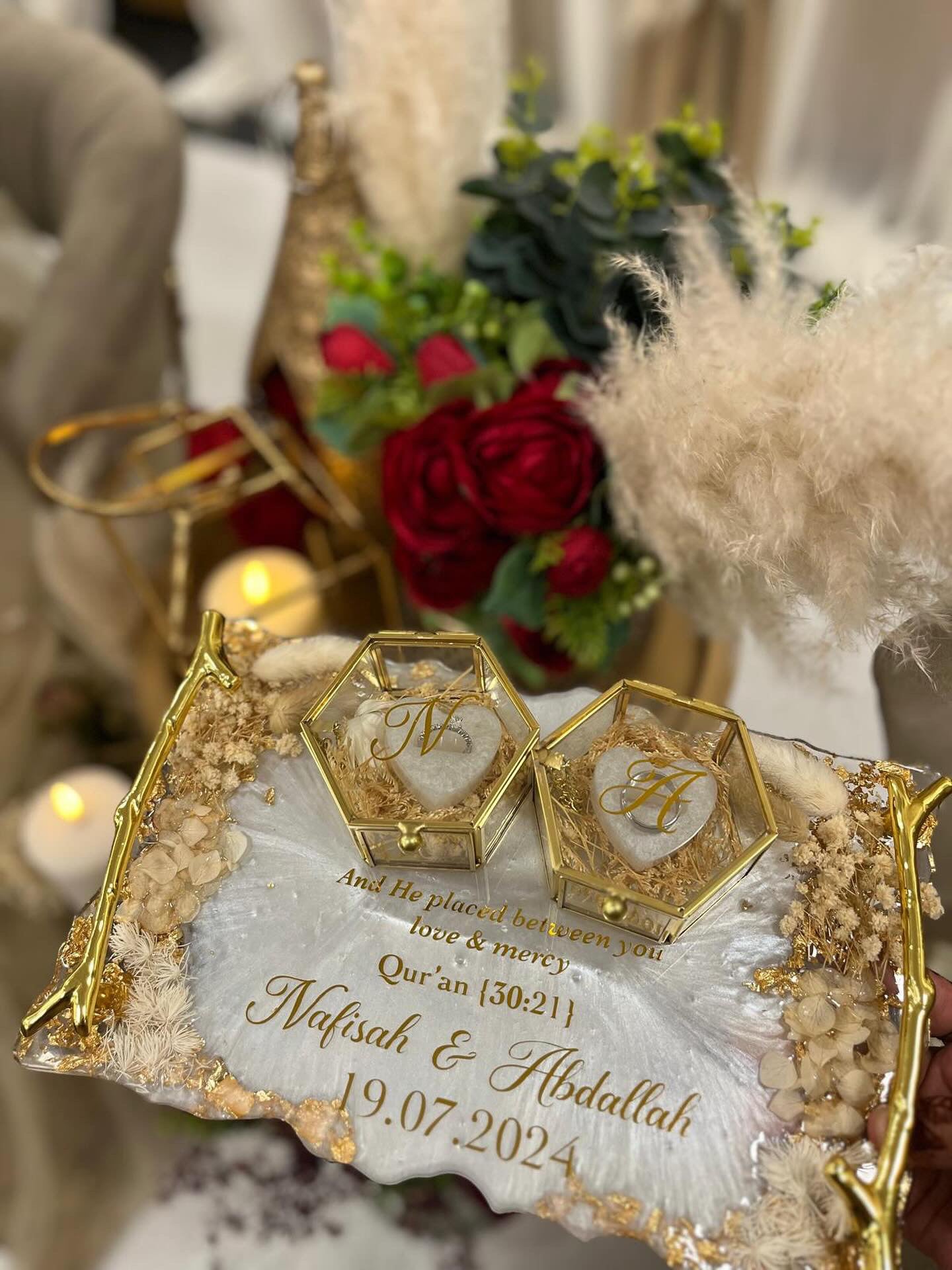 White and beige dried flowered ring tray