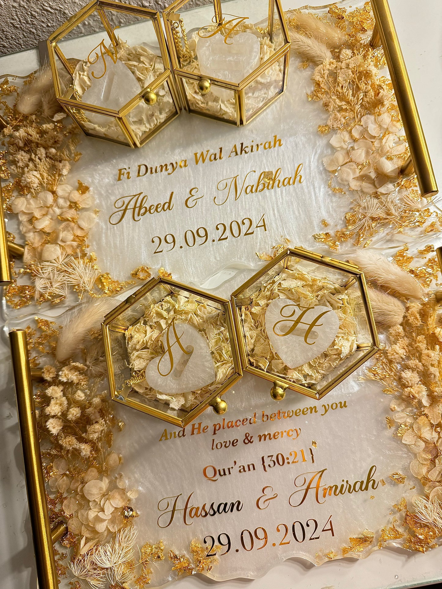 White and beige dried flowered ring tray