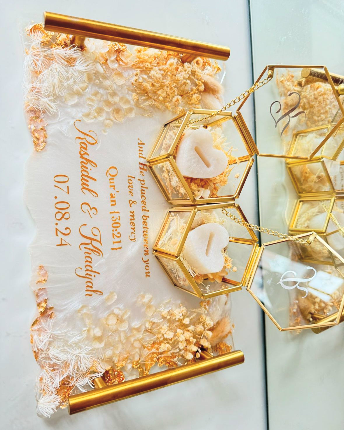 White and beige dried flowered ring tray