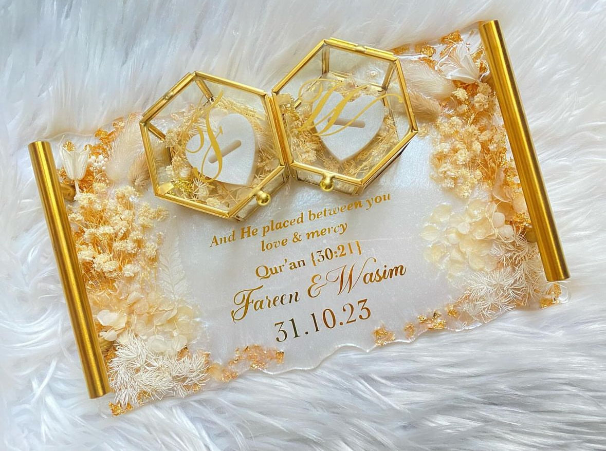 White and beige dried flowered ring tray
