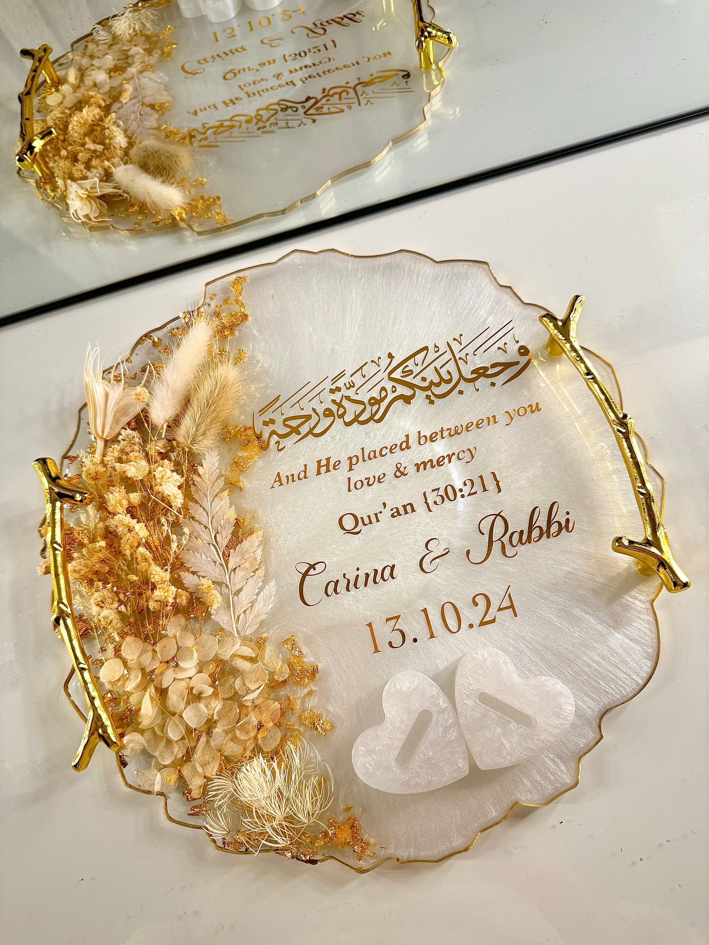 Dried white and beige petal ring tray