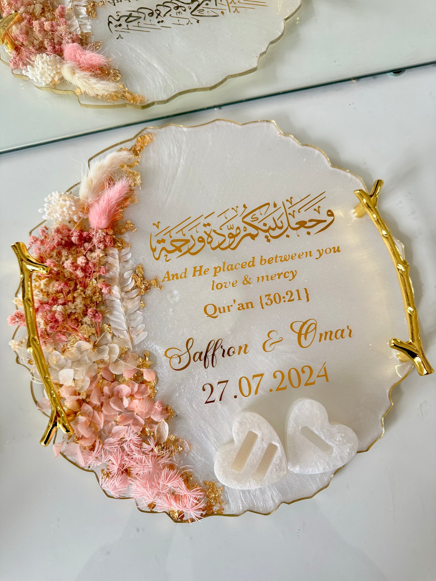 Dried pastel pink and gold ring tray