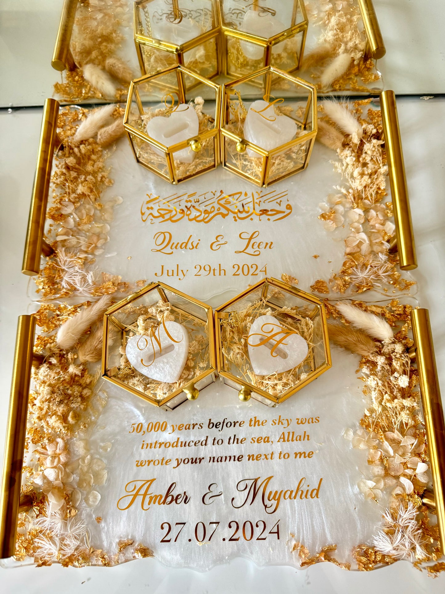 White and beige dried flowered ring tray