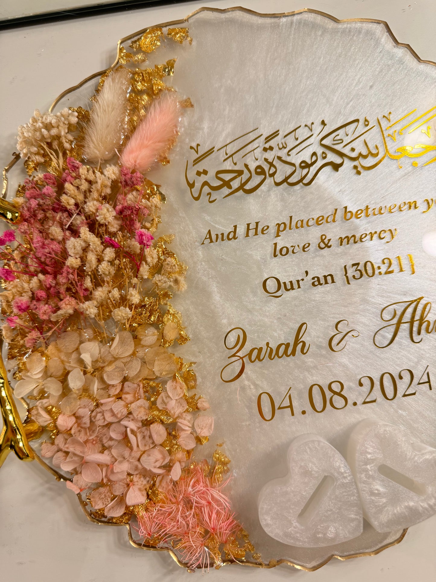 Dried pastel pink and gold ring tray
