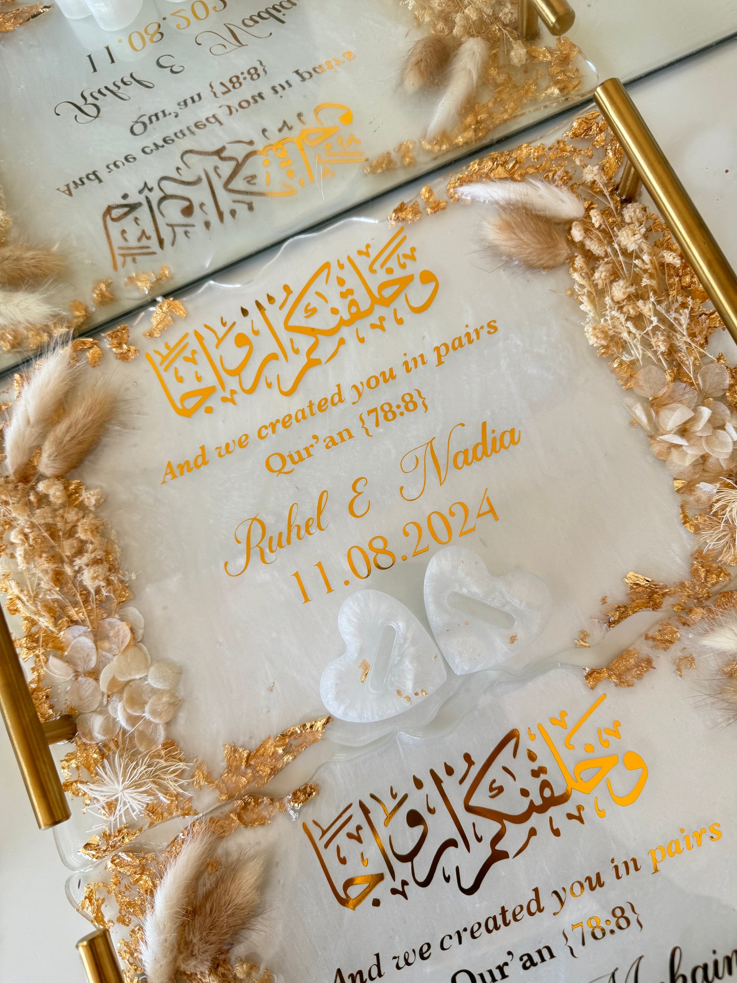 White and beige dried flowered ring tray