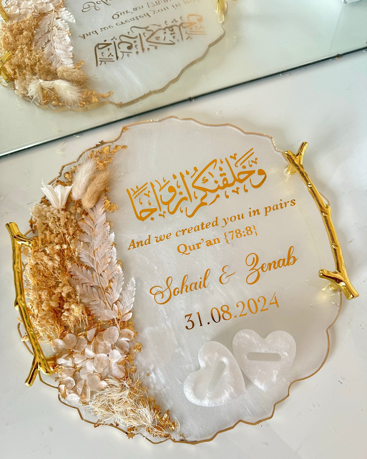 Dried white and beige petal ring tray