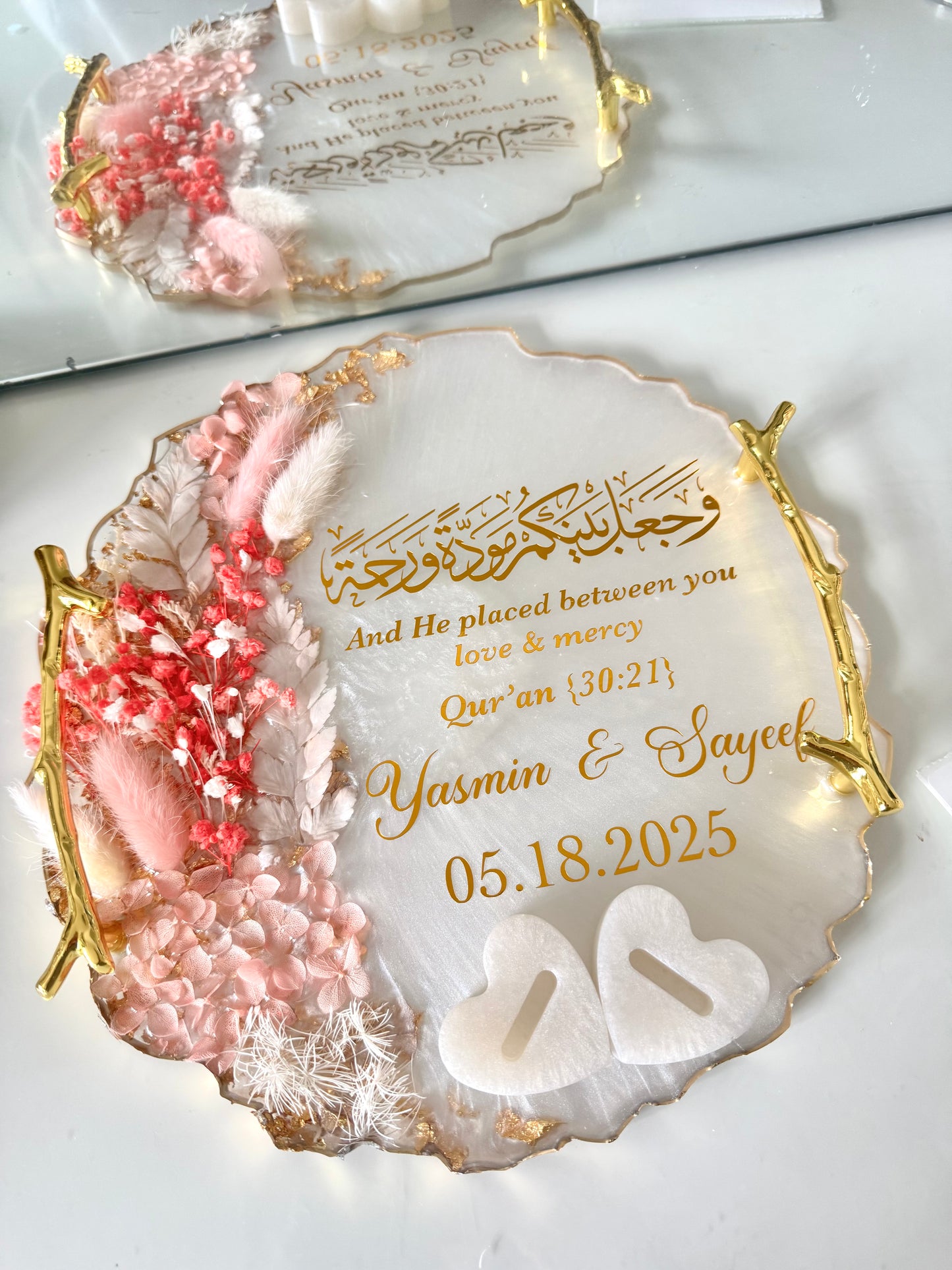 Dried pastel pink and gold ring tray